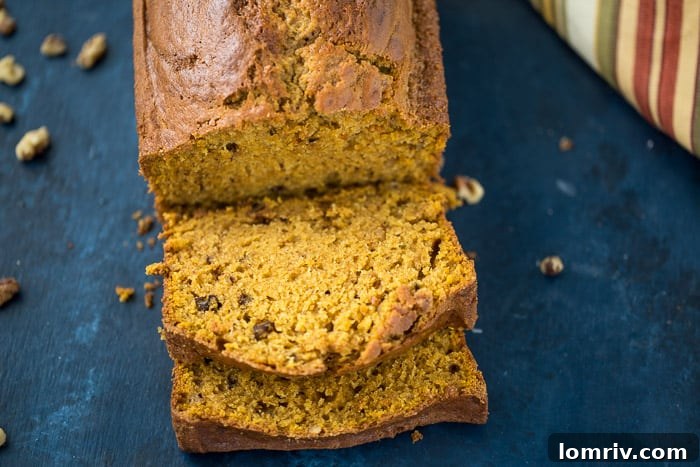 Freshly baked Classic Pumpkin Bread with walnuts