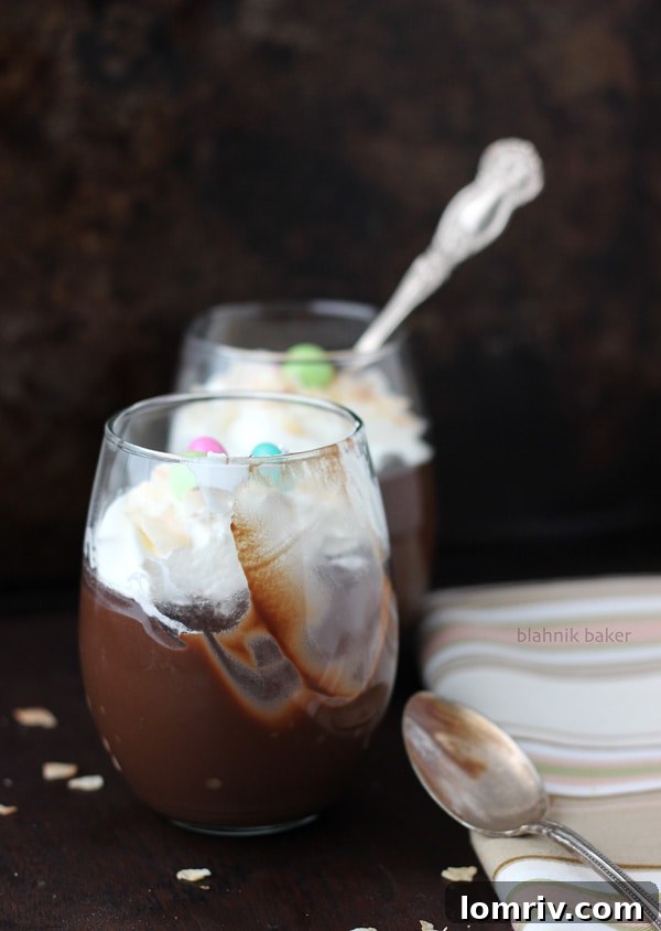 Individual servings of gourmet Dark Chocolate Coconut Pudding with various toppings, beautifully arranged