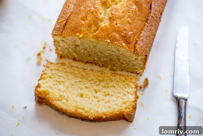 A slice of Browned Butter Meyer Lemon Cake with a cup of coffee.