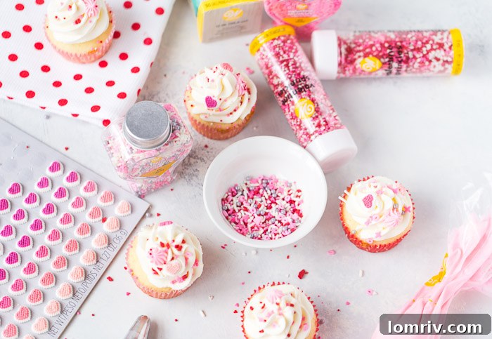 Close-up of fluffy Vanilla Bean Buttermilk Cupcakes decorated with sprinkles