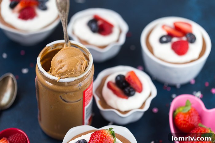 Peanut Butter Chocolate Mousse dessert cups ready to be served, showcasing the elegant presentation.