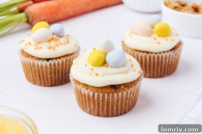 More decorated carrot cake cupcakes, showcasing their delightful appearance.