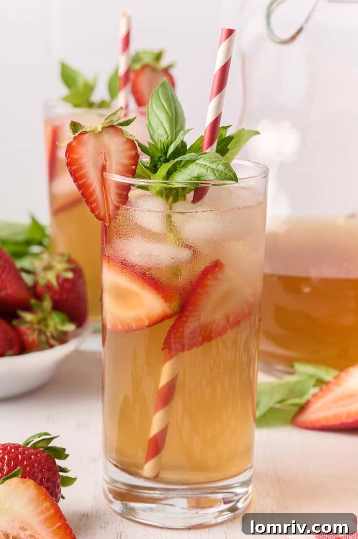 Close-up of fresh strawberries and basil leaves