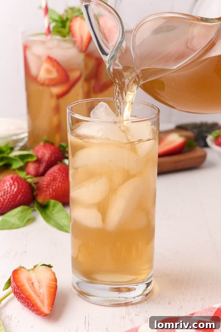 Pitcher of Strawberry Basil Iced Tea on a table