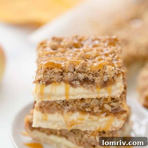 Triple layer apple crumble cheesecake bars, a unique fall dessert.