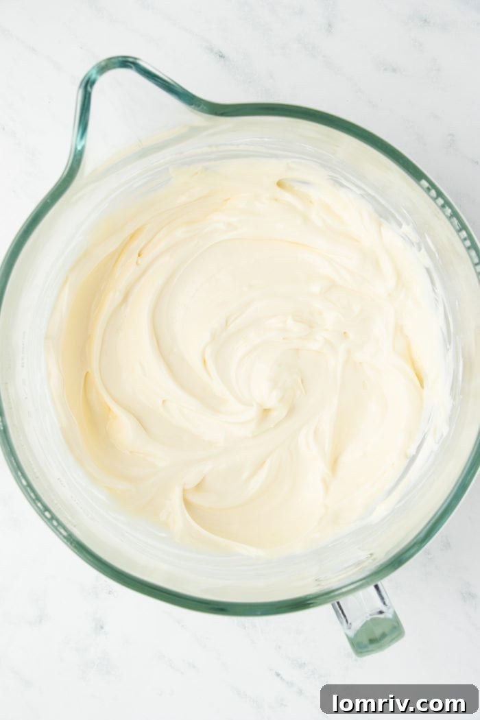 The cream cheese mixture in a mixing bowl.