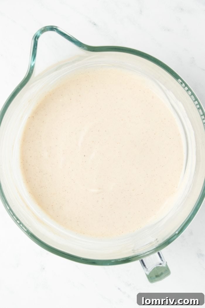 The cream cheese mixture with eggs added to it.