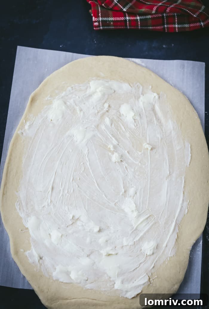 Rolling Dough and Spreading Butter for Cinnamon Rolls