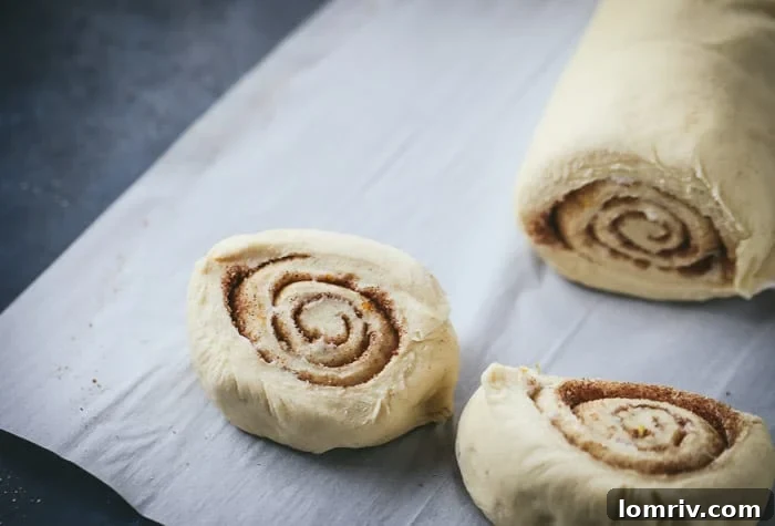 Cutting Eggnog Cinnamon Rolls with Dental Floss