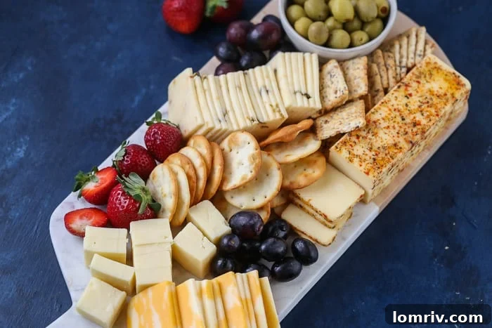 adding cured meats and other savory items to a cheese board