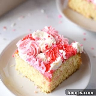 Valentine's heart sheet cake, a classic buttermilk yellow cake decorated with fluffy buttercream.