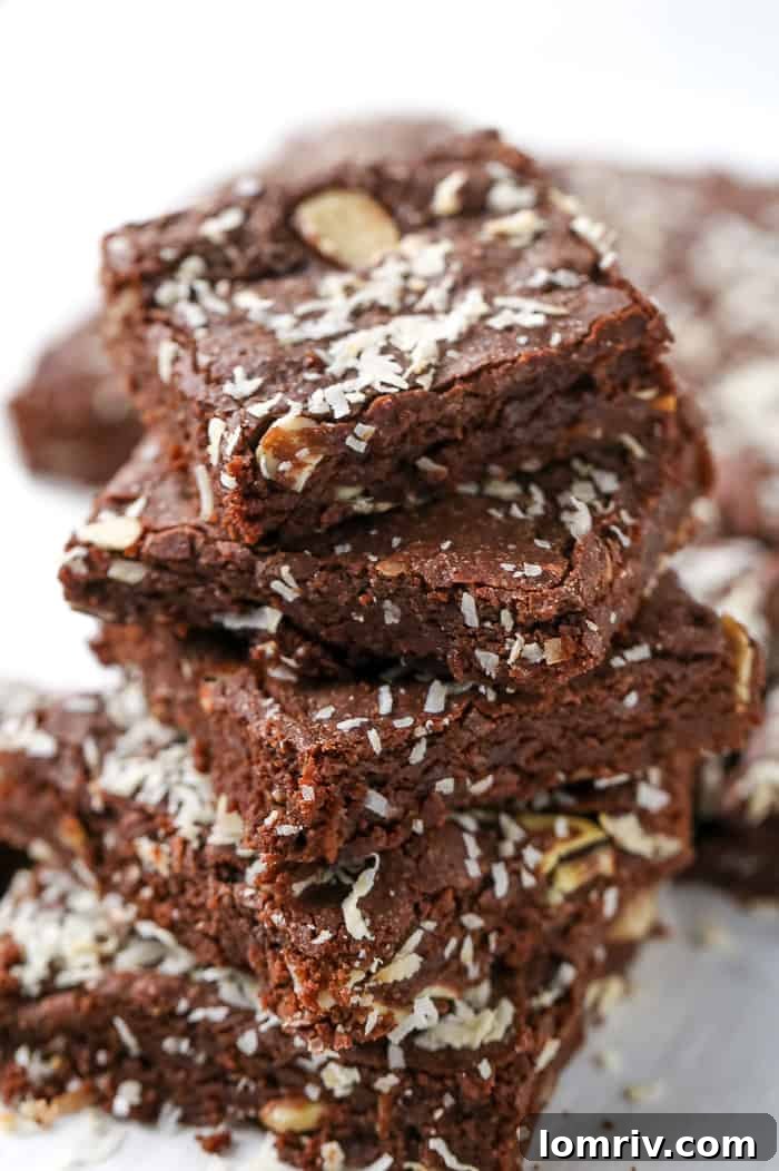 Coconut Brownie Squares on a Cooling Rack