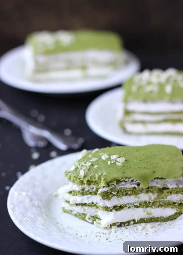 A Generous Slice of Matcha Genoise Cake on a Plate