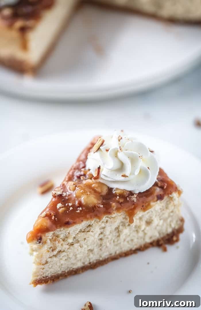 An overhead shot of the full Banana Foster Cheesecake, showcasing the vibrant topping