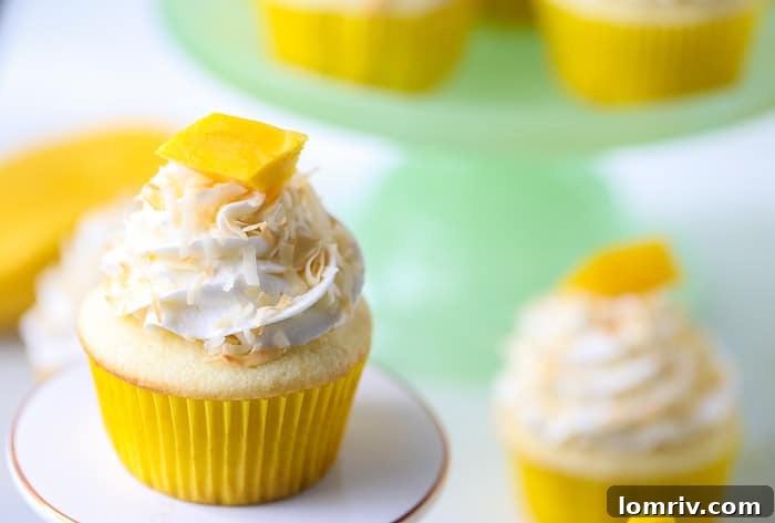 Mango Coconut Cupcakes with Toasted Coconut Flakes