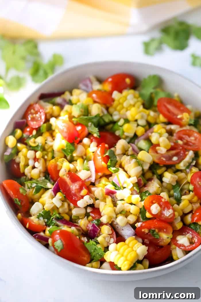 Summer Corn Salad with Fresh Crunchy Corn, Juicy Cherry Tomatoes, and Jalapeno