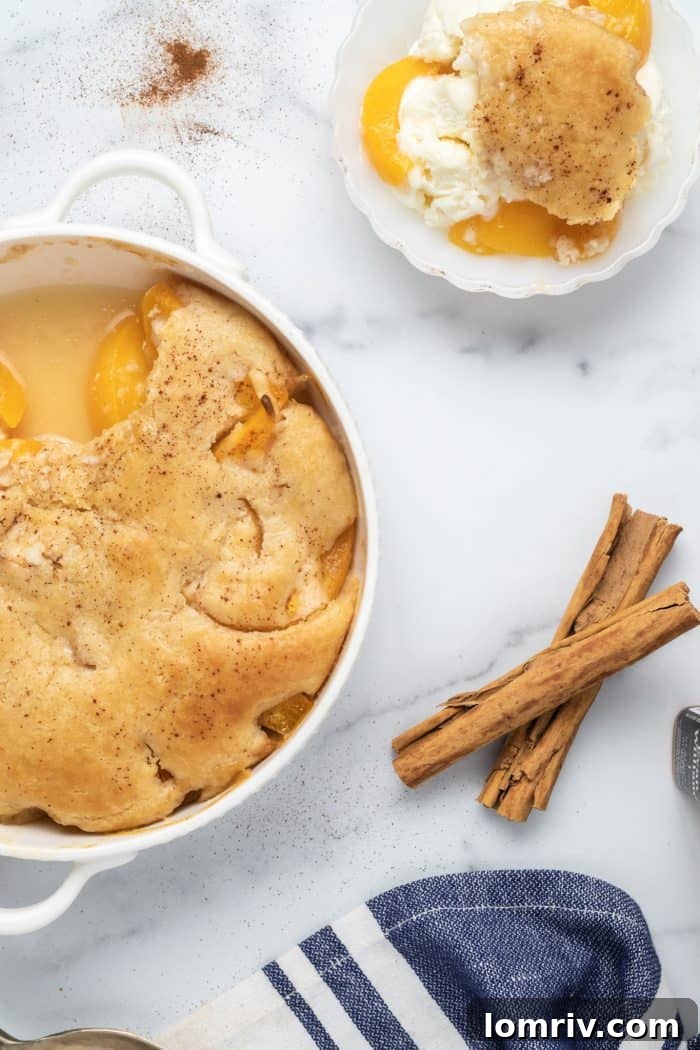 Bourbon Peach Cobbler fresh out of the oven, bubbling and golden