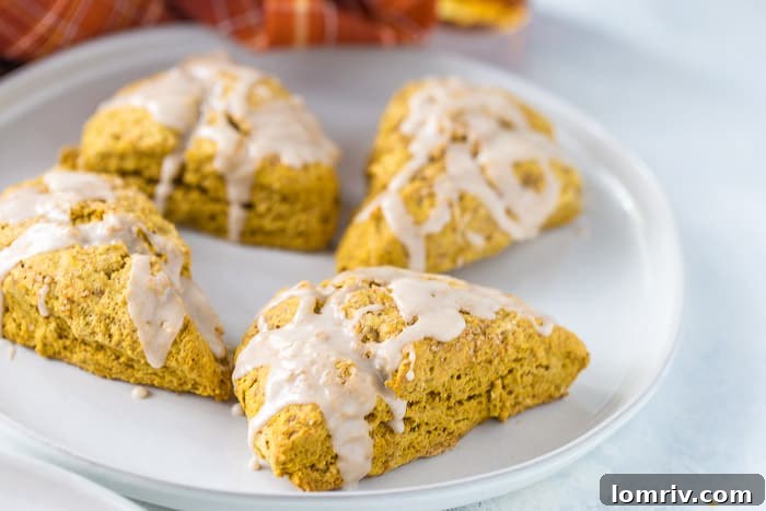 Pumpkin scones with maple glaze and fresh fruit