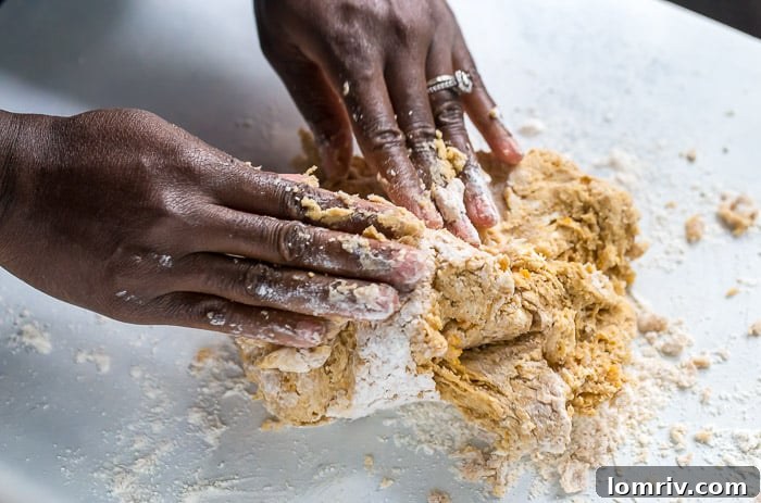 Step 5: Lightly kneading scone dough on a floured surface