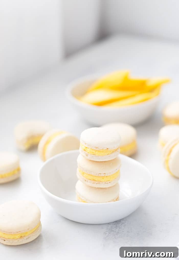 Bright Mango Macarons filled with luscious cream