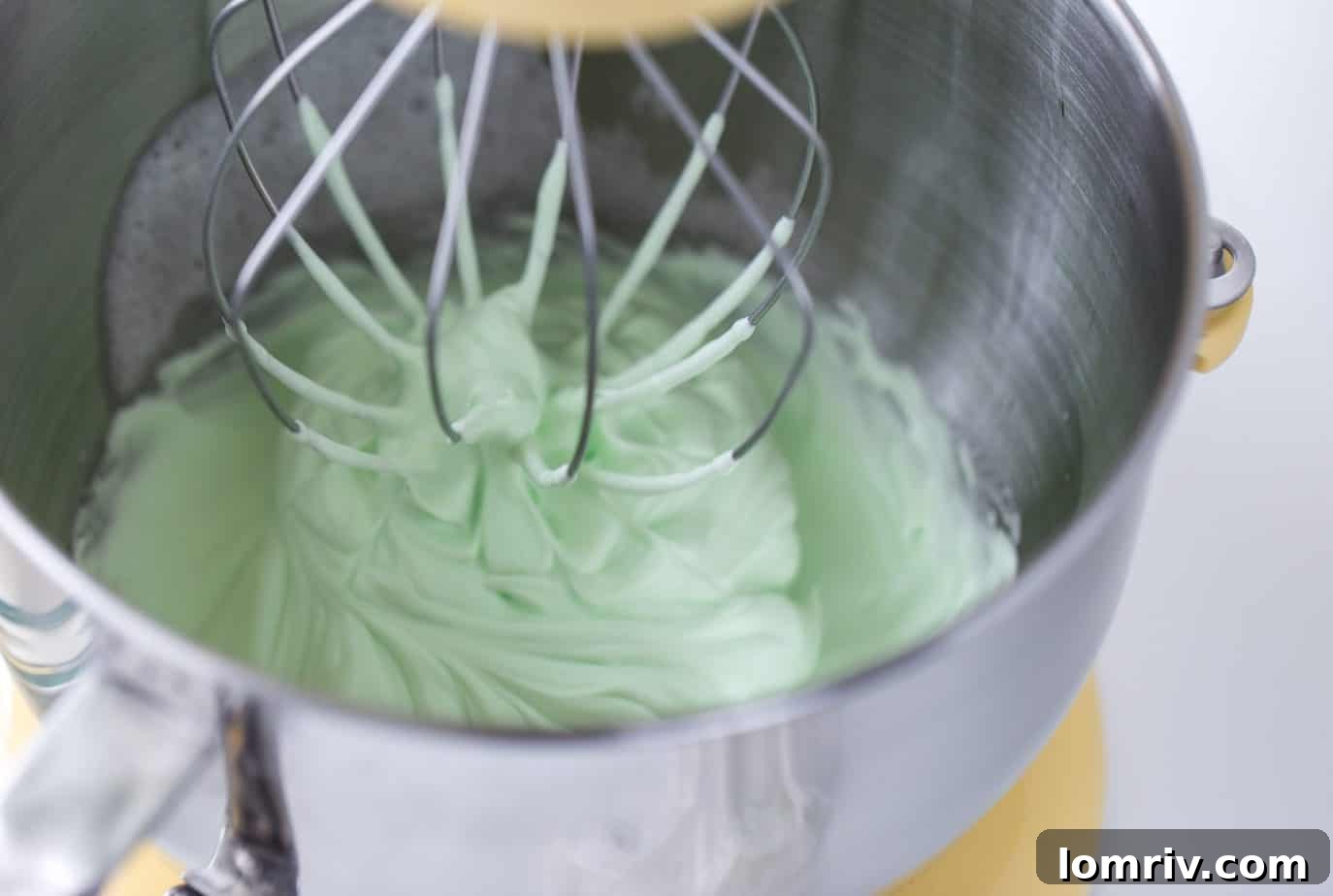 Stiff peaks of egg whites for lemon lime macarons