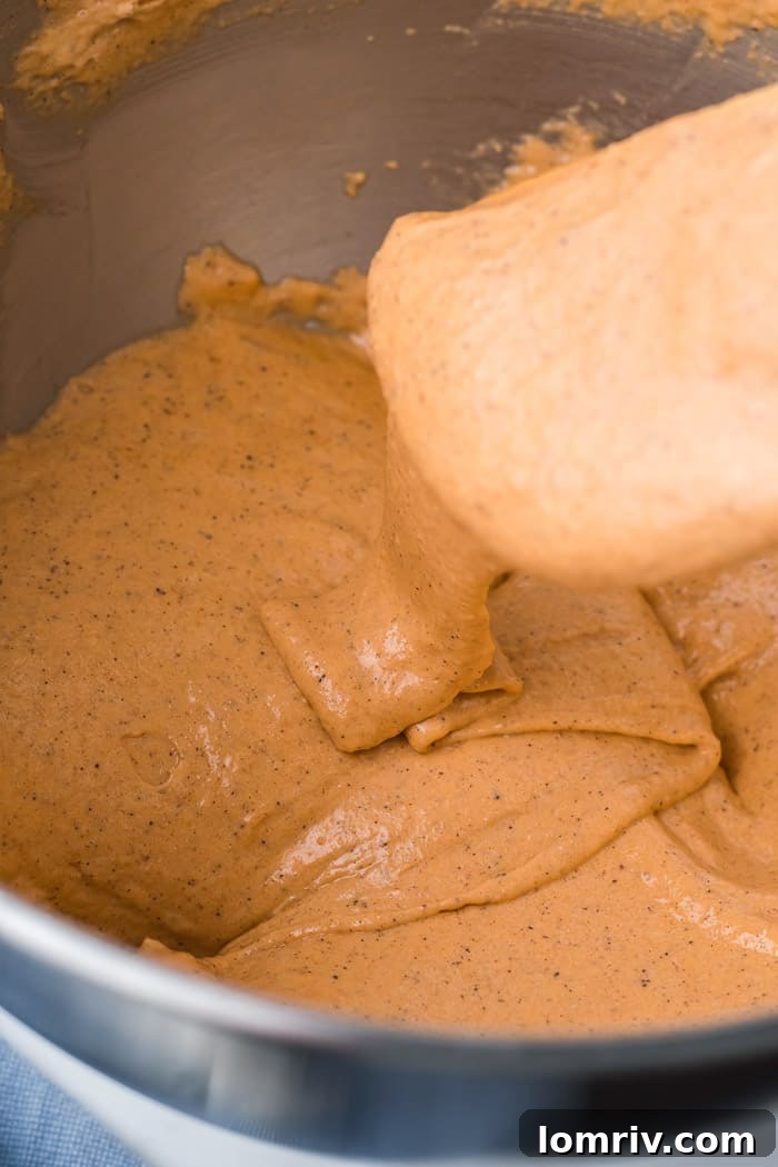 Macaron batter at the perfect 'ribbon stage' for successful pumpkin spice latte macarons