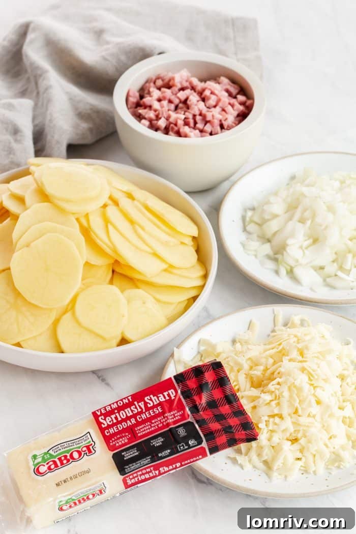A close-up of thinly sliced potatoes and diced onions, perfectly prepped for layering into a baking dish to create Grandpa's Scalloped Potatoes.