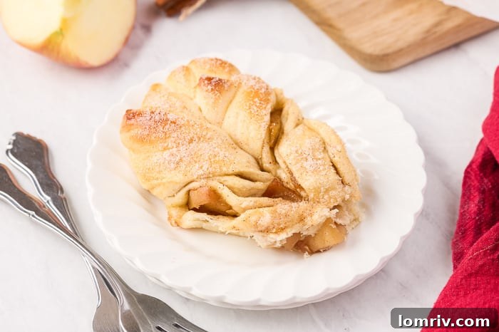 Close-up of a slice of Apple Cinnamon Star Bread on a plate