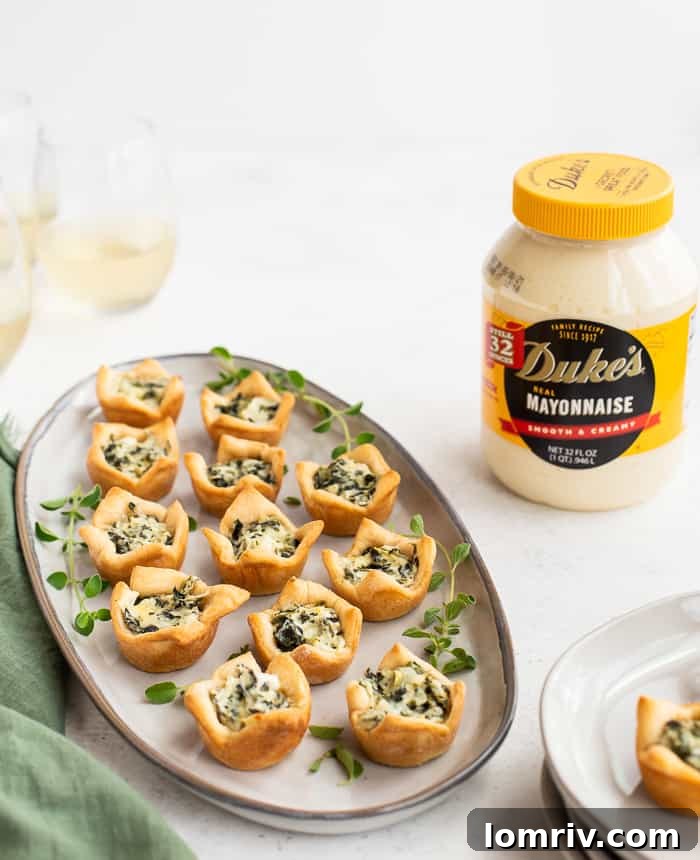 Close-up of baked Spinach Artichoke Dip Bites