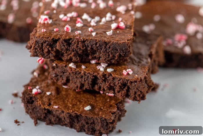 Rich, fudgy peppermint mocha brownies topped with crushed candy canes, perfect for the holidays