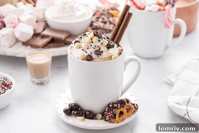 Homemade Hot Chocolate in a white mug with whipped cream and sprinkles