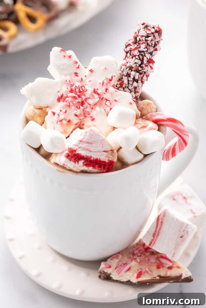 Hot chocolate charcuterie board with mugs, ready for serving.