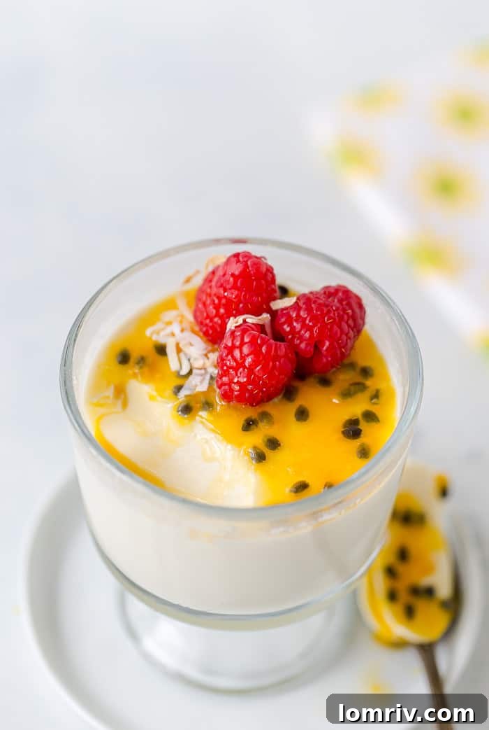 Close-up of a Passionfruit Coconut Panna Cotta with fruit topping.