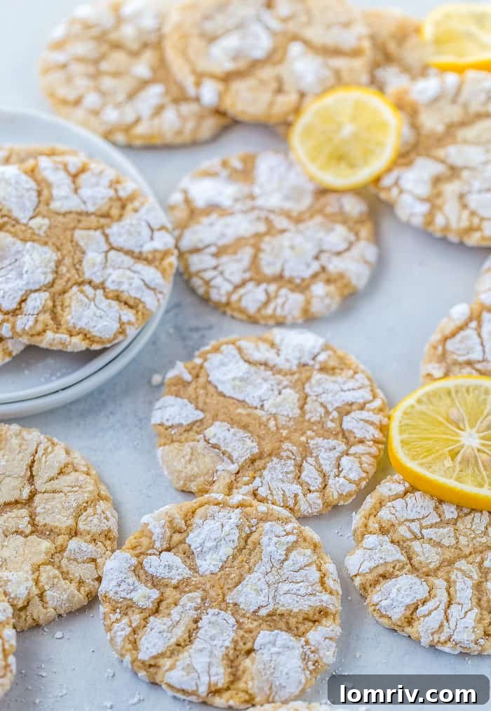 A plate of homemade Meyer Lemon Crinkle Cookies, ready to be enjoyed, highlighting their soft texture and sweet-tart balance.