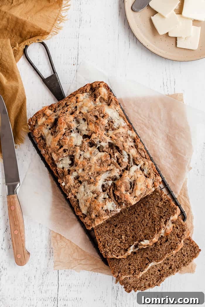 Delicious Garlic Cheddar Beer Bread, served warm and ready to enjoy.
