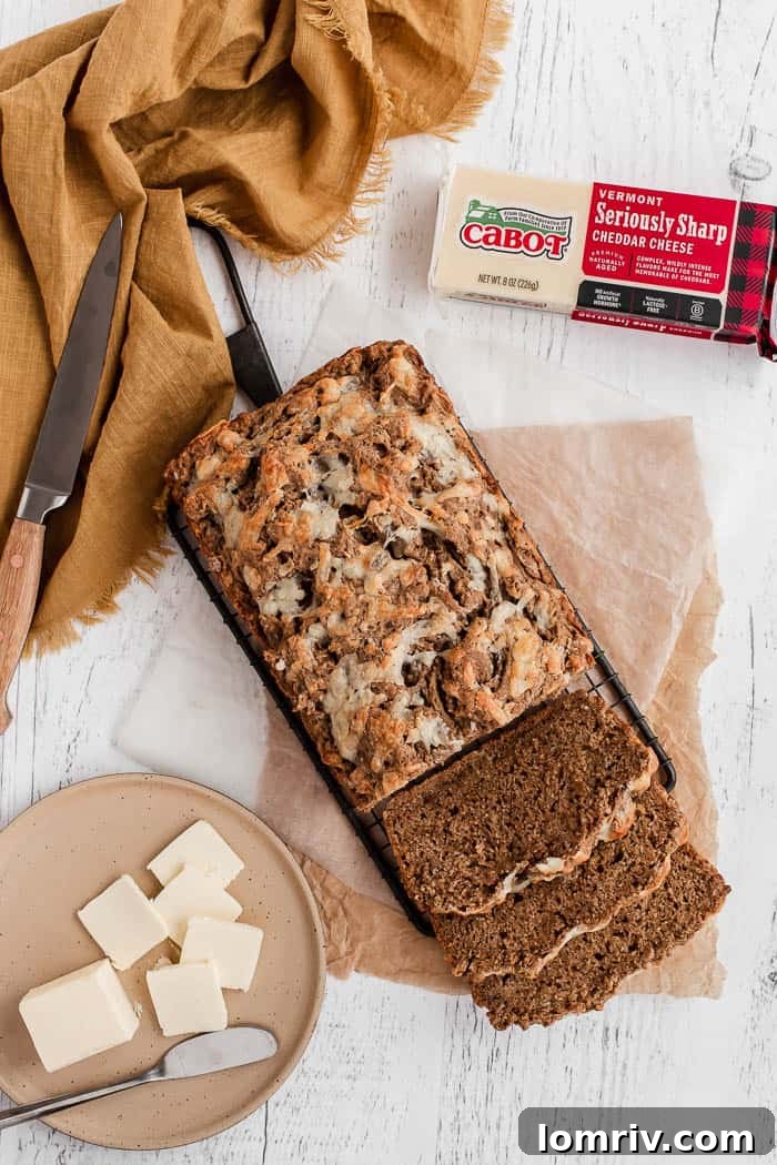 Golden-brown Garlic Cheddar Beer Bread with a cheesy crust.