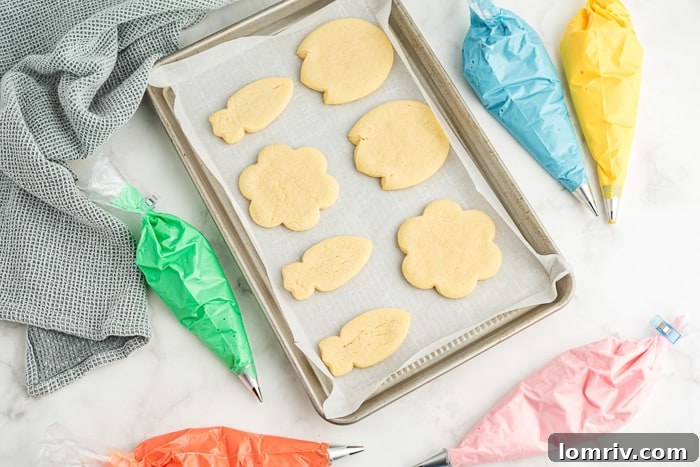 Plain baked spring sugar cookies in various shapes, ready for decoration