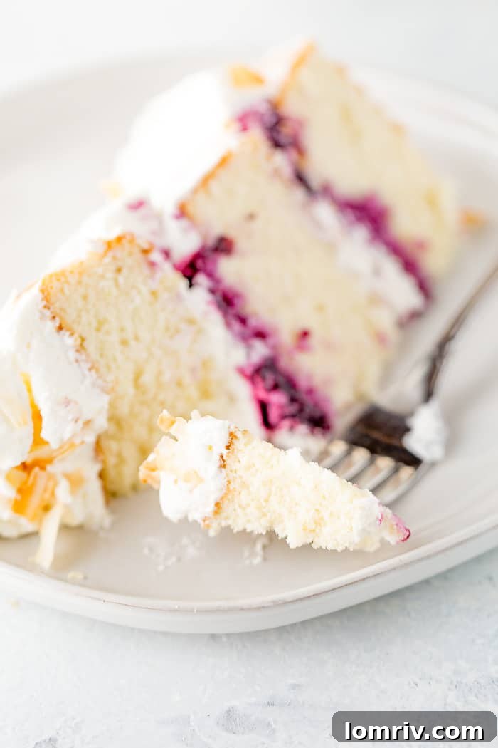 Close-up of Coconut Blueberry Layer Cake, ready to be enjoyed.