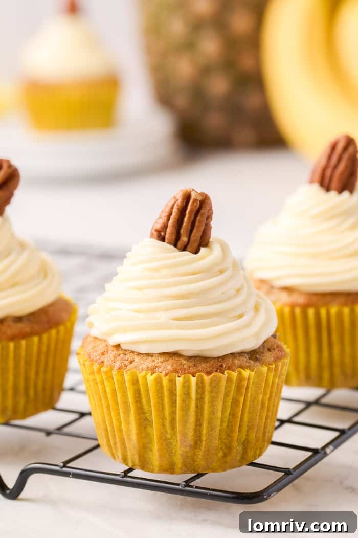 Closeup of freshly baked Hummingbird Cupcakes before frosting, showing the texture.