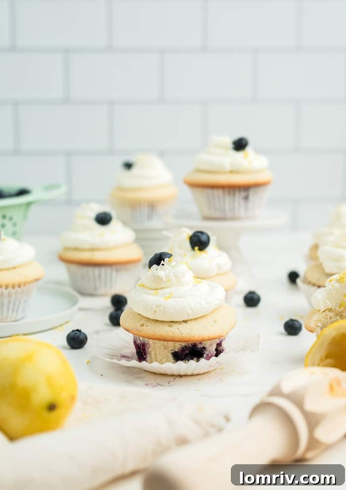 Delicious and moist Coconut Blueberry Cupcakes, perfect for a summer treat with tropical flavors.