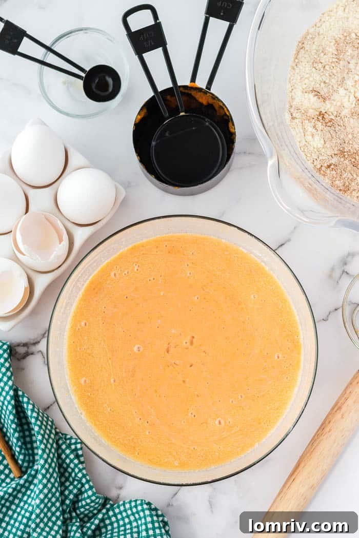 Mixing Wet Ingredients for Pumpkin Pancakes