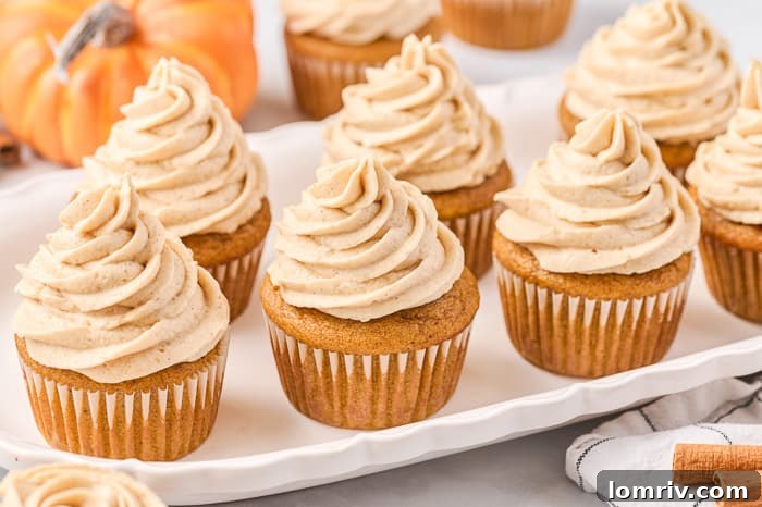 Close-up of fluffy brown sugar swiss meringue buttercream in a mixer bowl