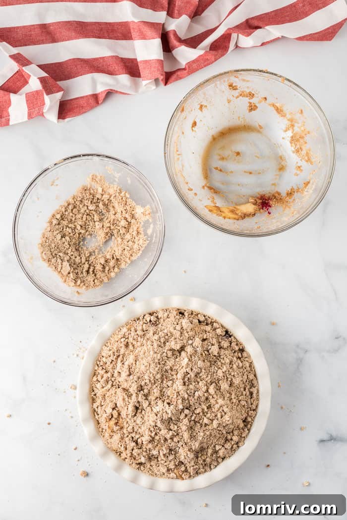 Cranberry Apple Crisp baking in the oven, golden brown and bubbly