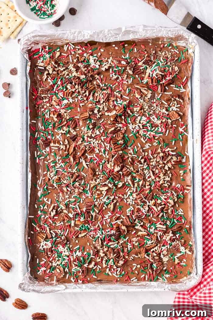 Individual pieces of Christmas Cracker Candy with toppings