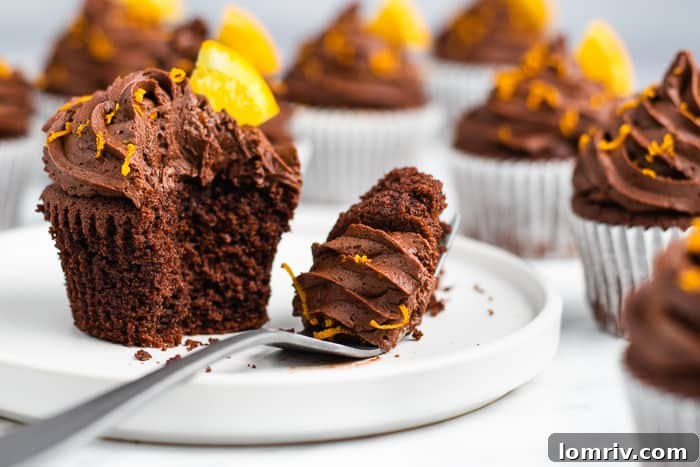 Plate of Chocolate Orange Cupcakes with a cup of coffee