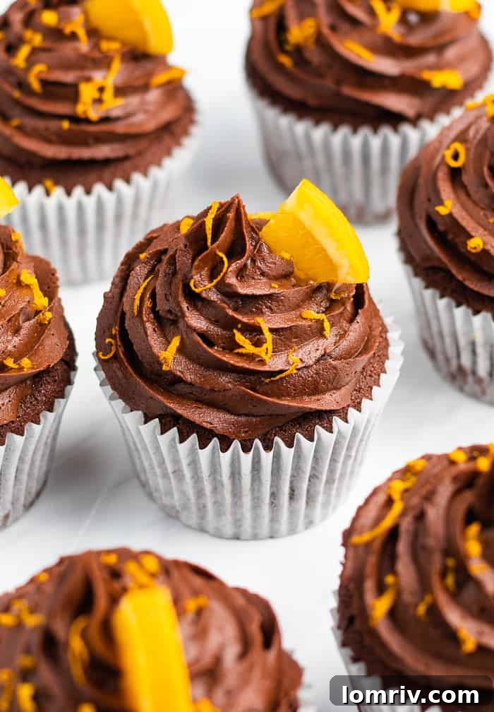 Stack of Chocolate Orange Cupcakes on a decorative plate