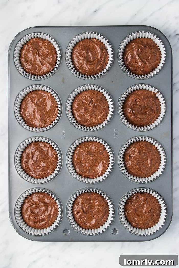Chocolate Orange Cupcake batter poured into liners