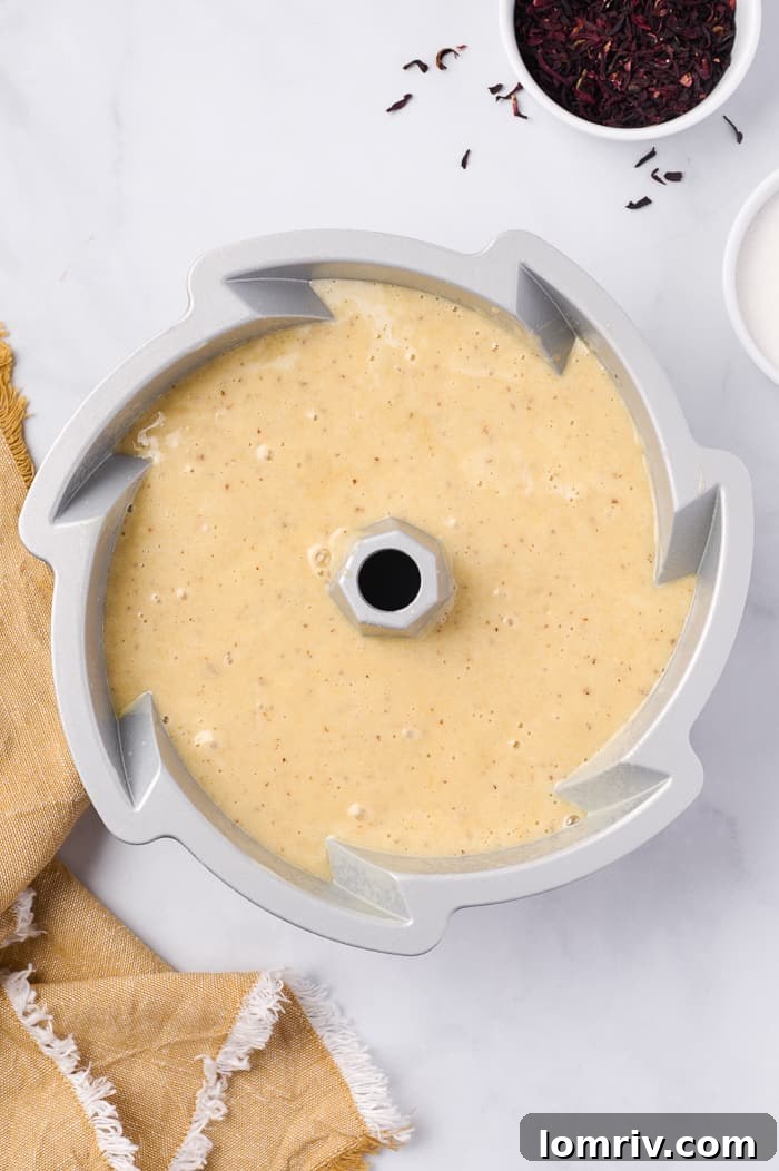 Close-up of baked Fonio Pound Cake, golden brown and perfectly risen from the bundt pan