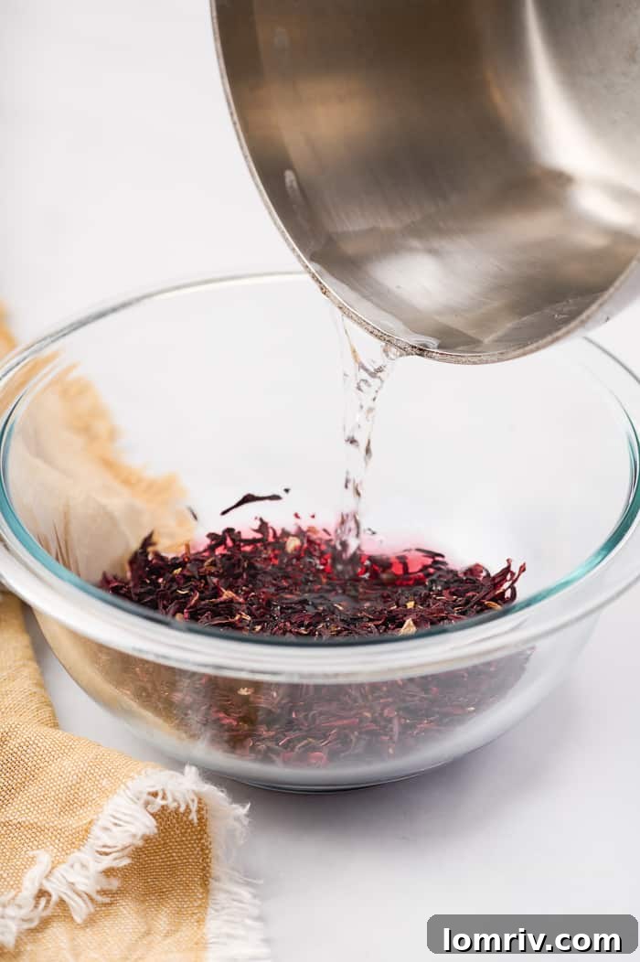 Close-up of the Fonio Pound Cake after being brushed with hibiscus syrup, enhancing its flavor