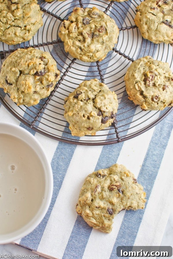 Warm, freshly baked Oatmeal Raisin Chocolate Chip Walnut Cookies